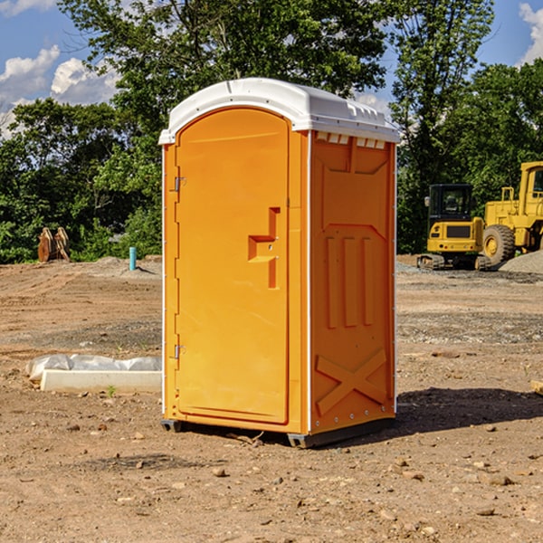 how often are the porta potties cleaned and serviced during a rental period in Woodland Mills